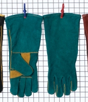 Green and gold welders glove, reinforced palm to first finger